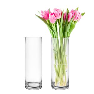 2 pieces of Clear Glass Cylinder Vase and decorated with flowers