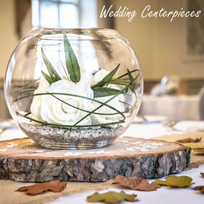Bubble bowl vase styled with floating candles and flowers